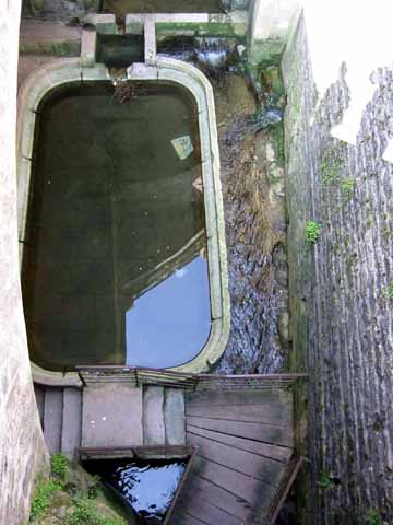 Photo, looking down into leper chamber