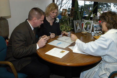 051230-4561_Signing