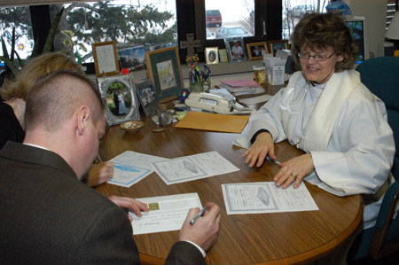051230-4565_Signing
