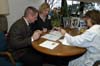 051230-4561_Signing