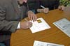 051230-4566_Signing