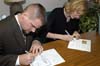 051230-4567_Signing