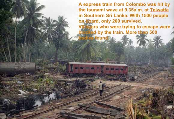 photo of rail car washed off the tracks