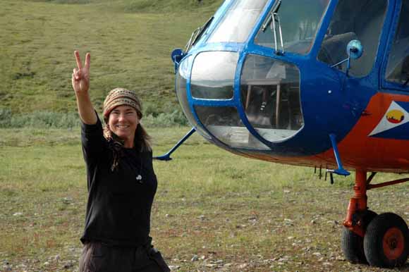 Photo of Elizabeth with a Russian helicopter