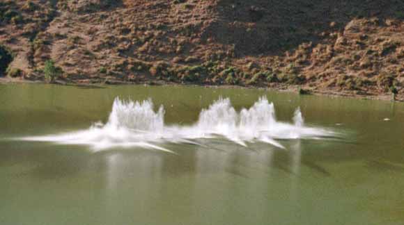 photo of explosion going off in a stream