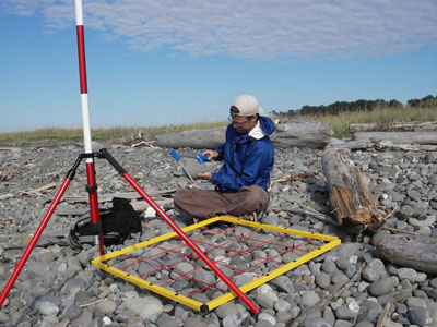 photo of Jon measuring a beach deposit