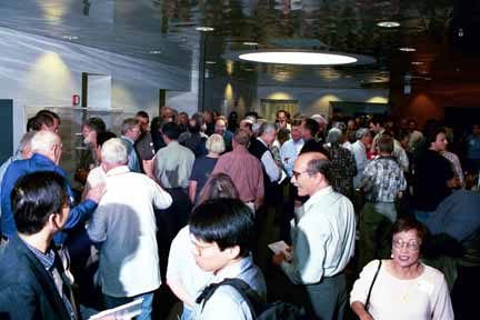 Crowd scene outside conference room