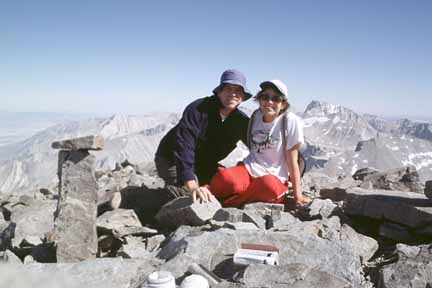 Photograph Mike and Anna on the summit.